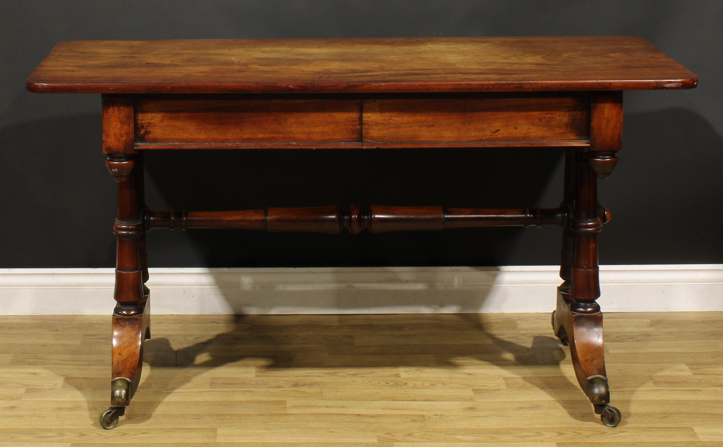 A Post-Regency mahogany library table, rounded rectangular top above a pair of frieze drawers, - Image 2 of 6