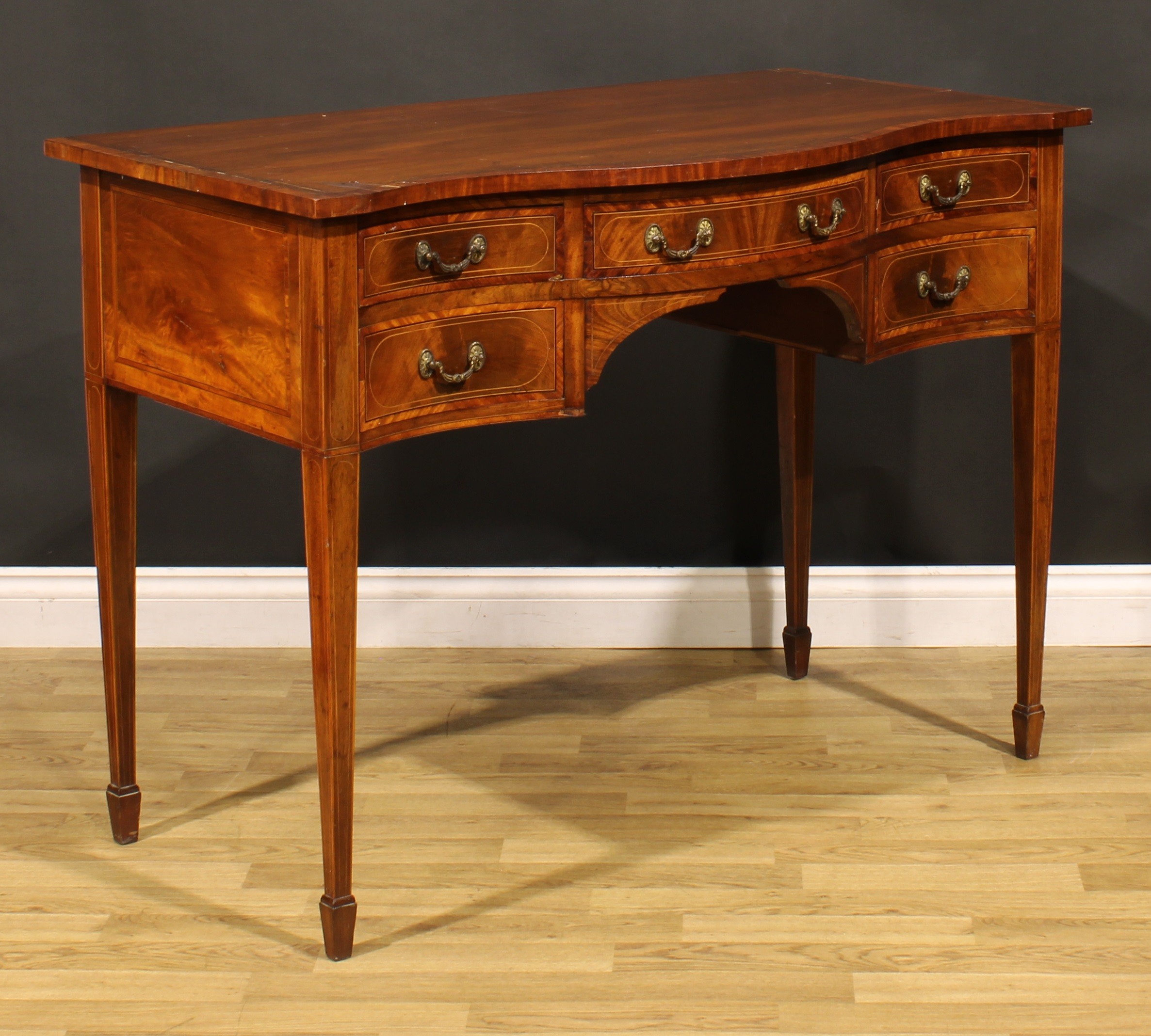A Sheraton Revival satinwood banded mahogany serpentine serving table, oversailing top above five - Image 3 of 6