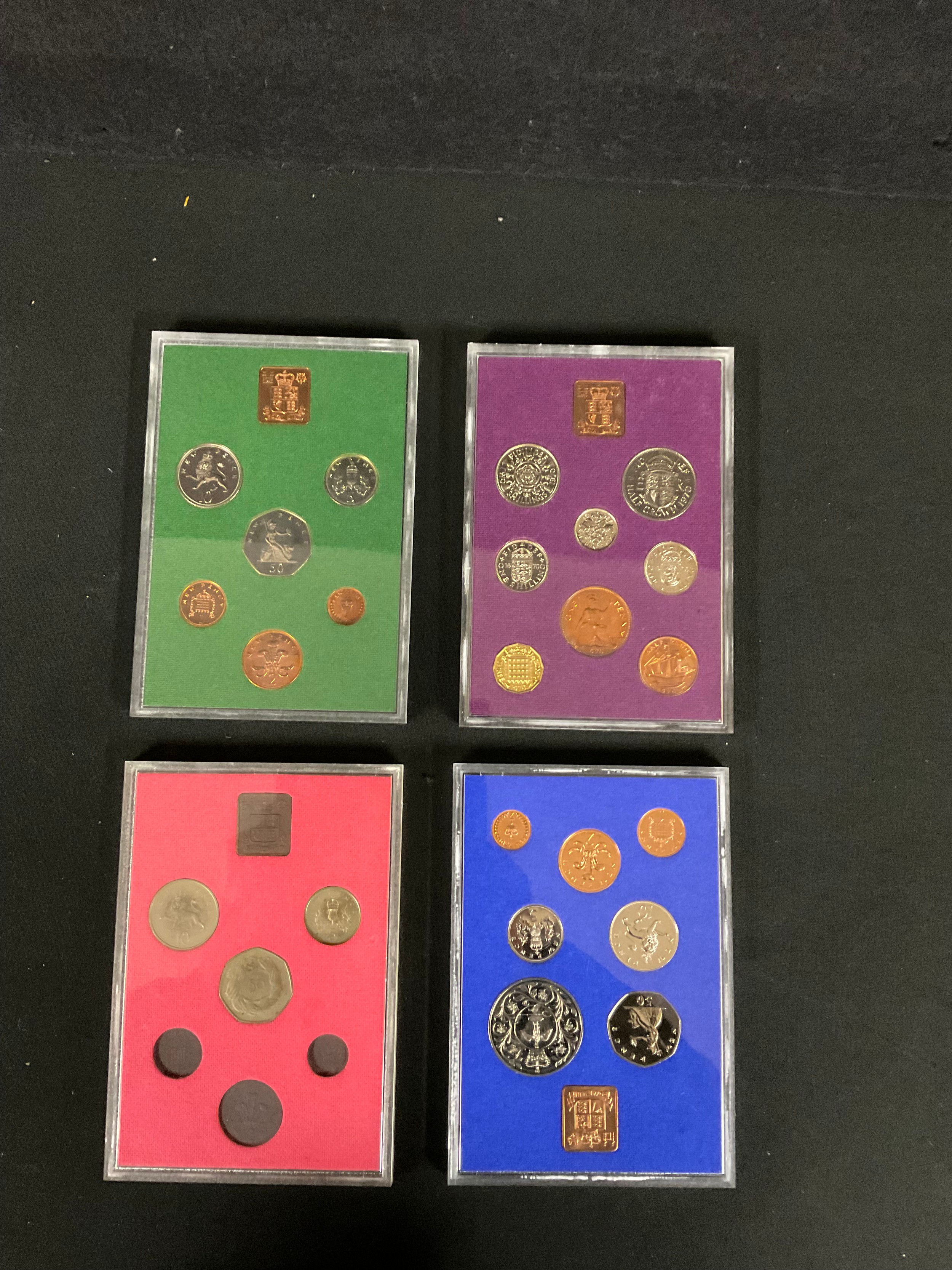 Coins - four proof sets, Coinage of GB and NI, 1970, 1973, 1975 and 1977
