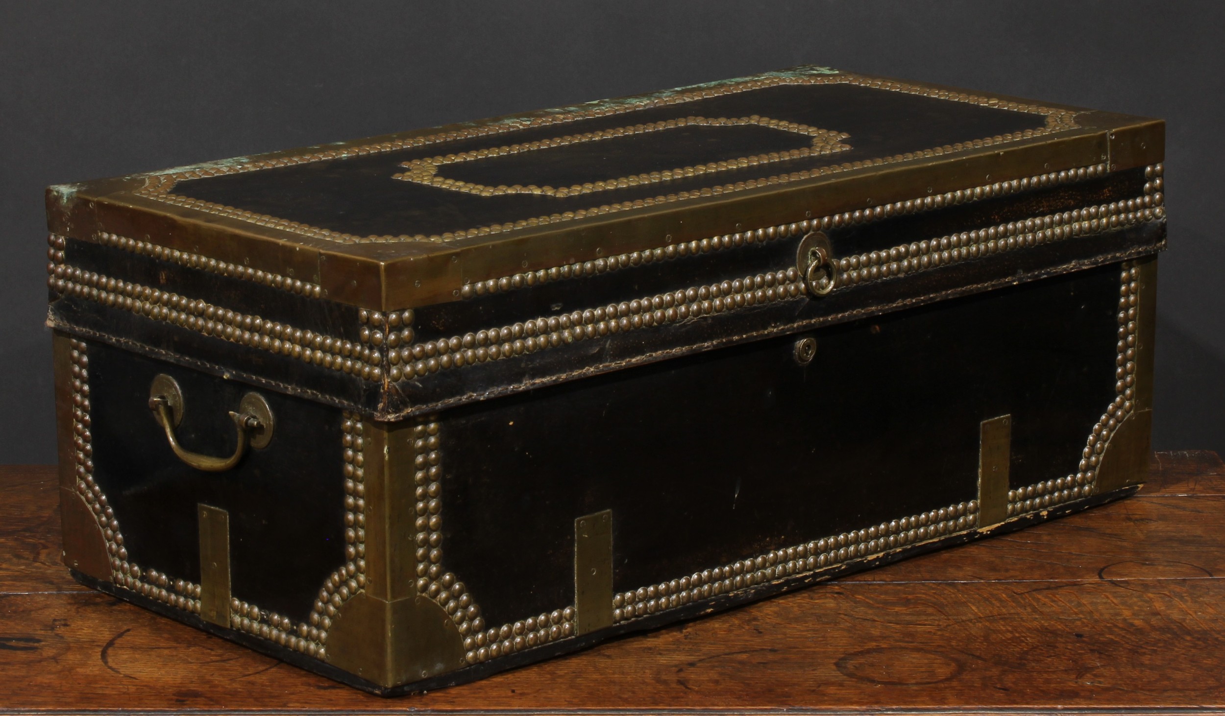 An early 19th century brass and studded leather mounted camphor travelling or coaching trunk, hinged - Image 2 of 5