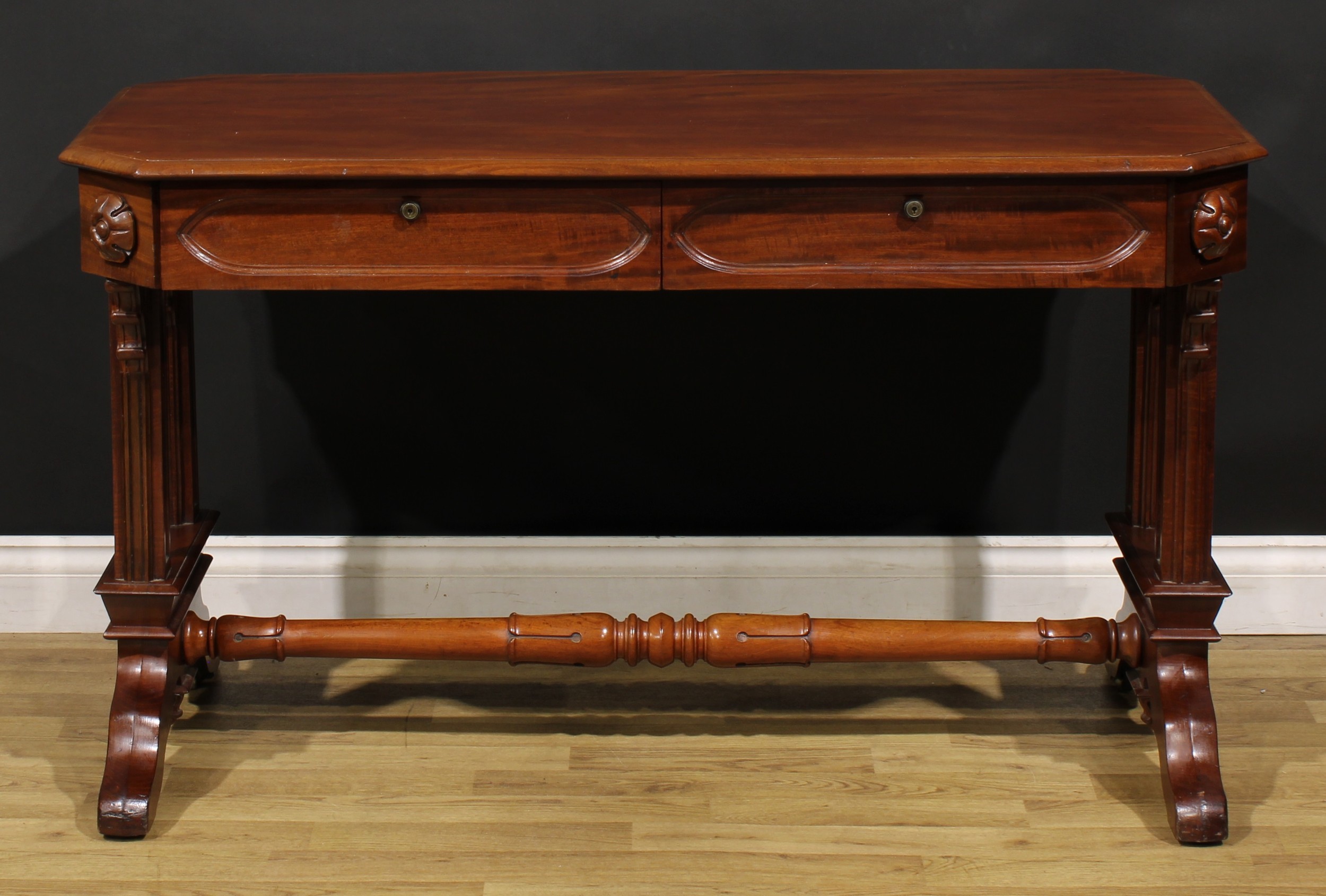 A Post-Regency Gothic Revival mahogany library table, canted rectangular top with moulded edge above - Image 2 of 6