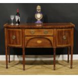 A George III mahogany sideboard or serving table, satinwood crossbanded top above a frieze drawer