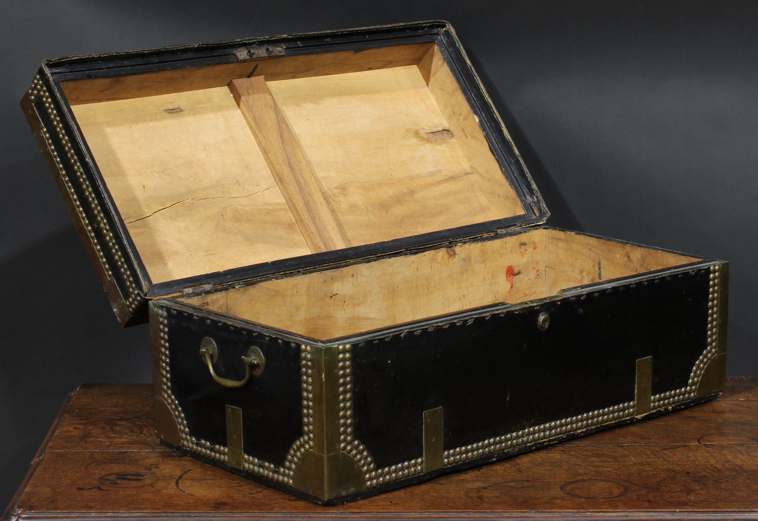 An early 19th century brass and studded leather mounted camphor travelling or coaching trunk, hinged - Image 3 of 5