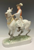 A large Herend porcelain figure by Markup Bela, man on horseback in traditional Hungarian dress,