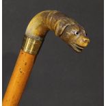 A 19th century novelty walking stick, the horn handle carved as the head of a dog, malacca cane,