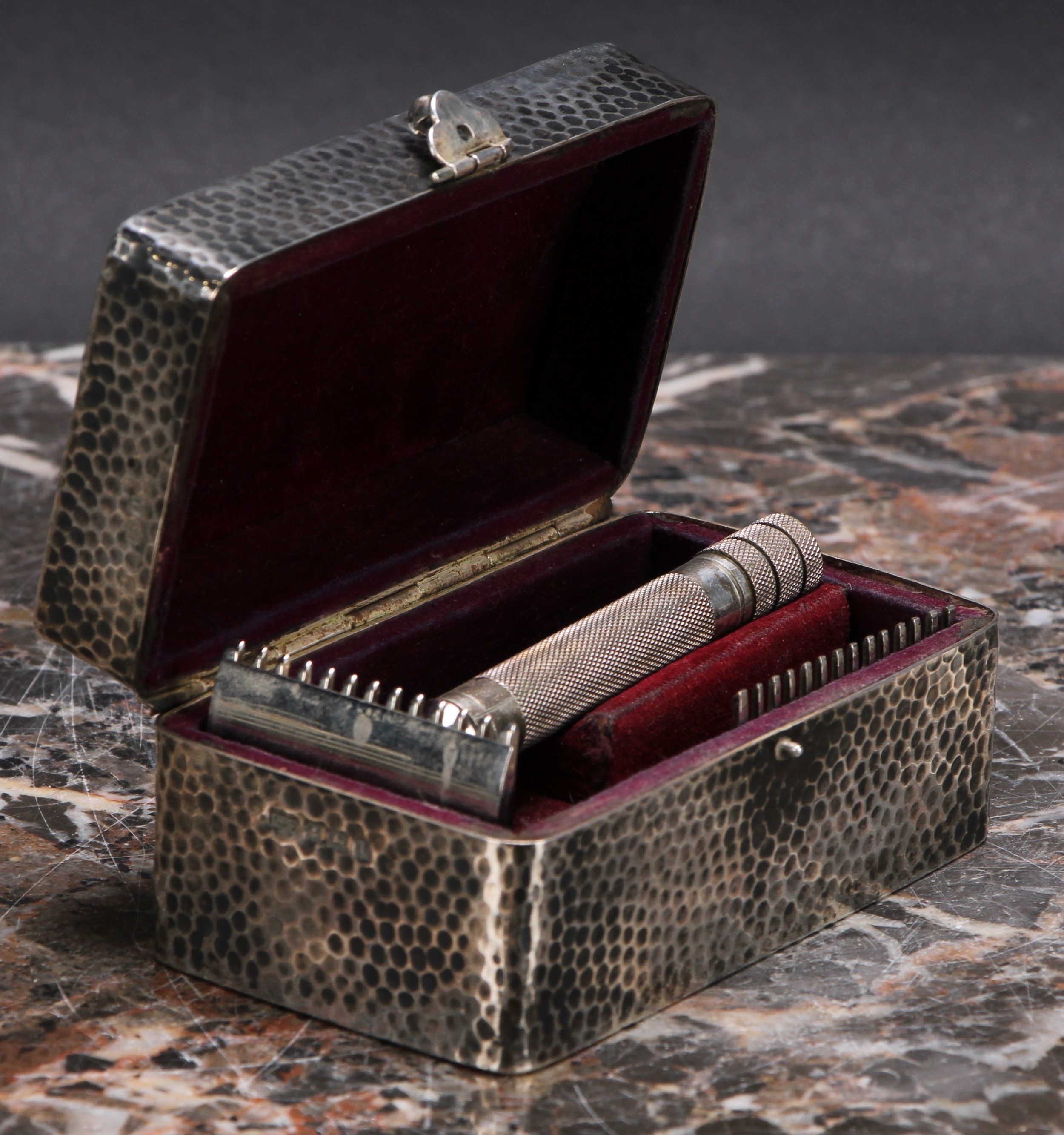 An Edwardian silver shaving box, planished overall, hinged cover enclosing a fitted interior with - Image 3 of 4