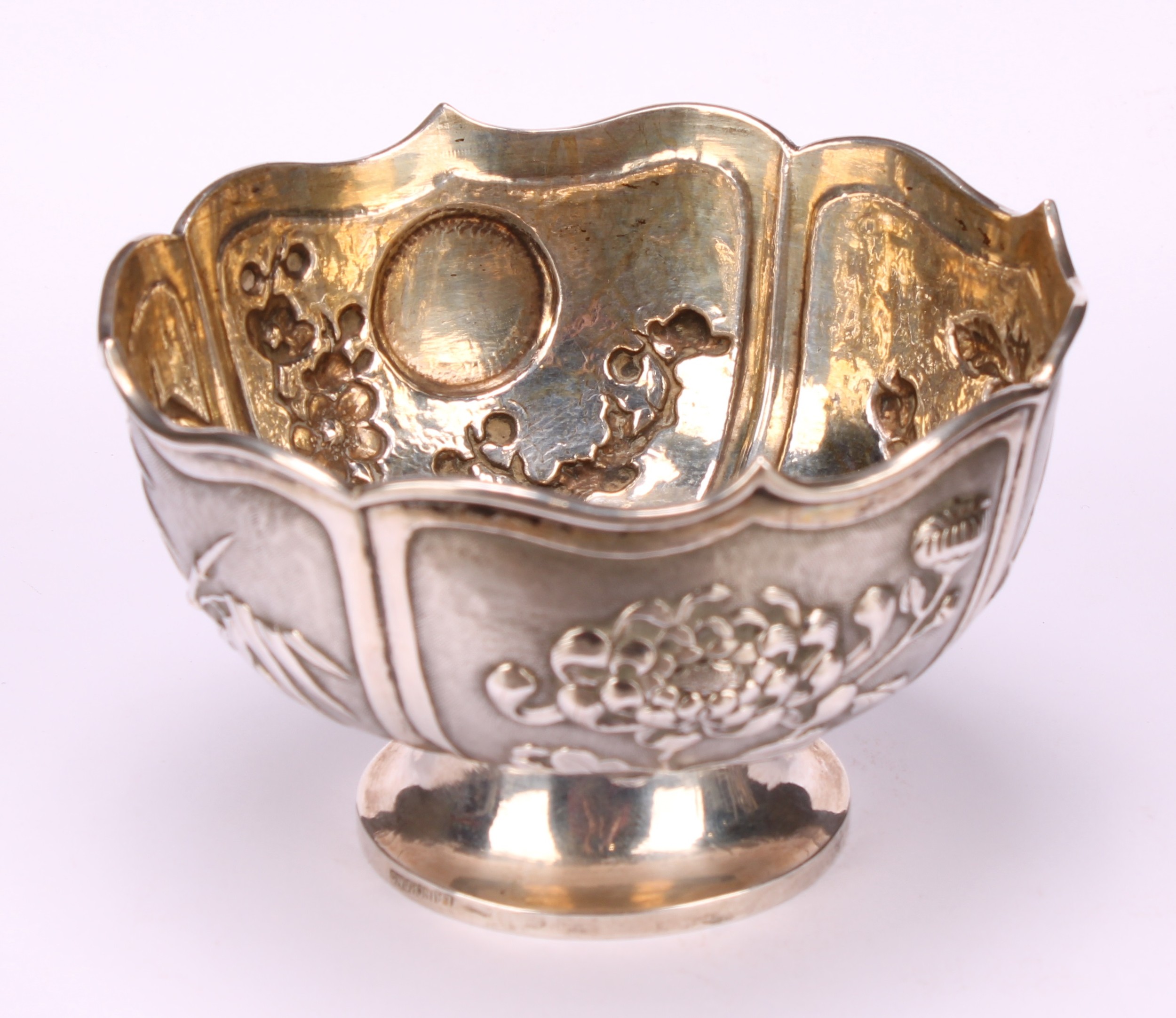 A Chinese silver lotus shaped pedestal bowl, applied with panels of chrysanthemums, bamboo, irises - Image 3 of 4