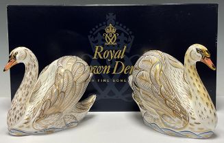 A pair Royal Crown Derby paperweights, The Royal Swans, William and Catherine, exclusive to Govier's