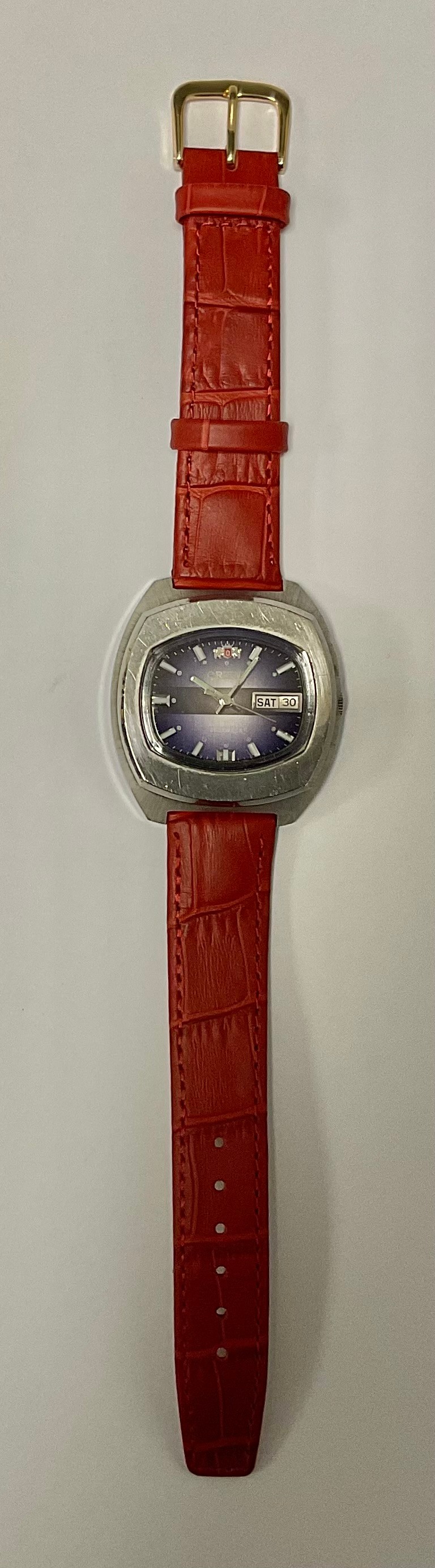 A 1970s Orient automatic day date wristwatch