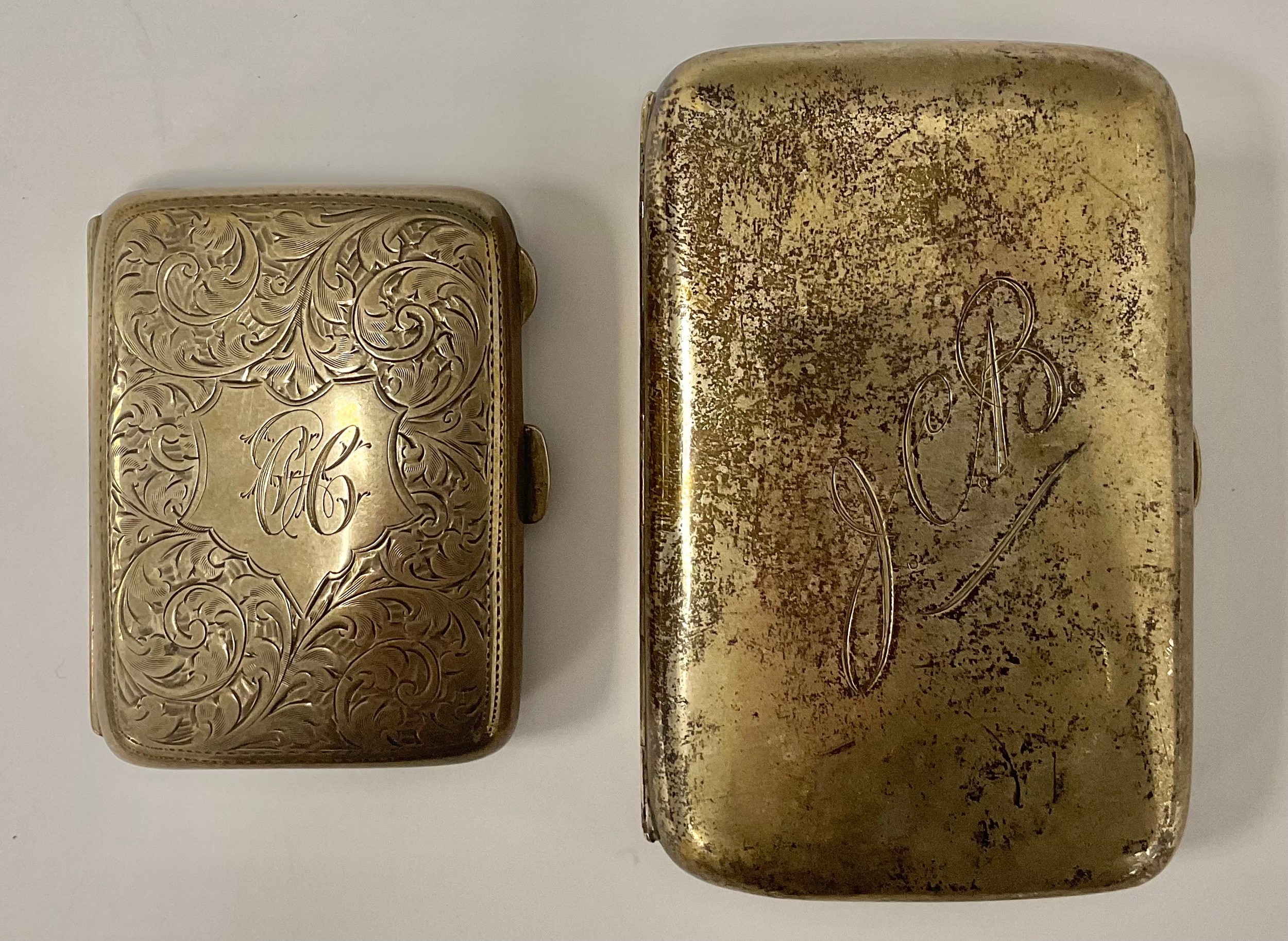 A late Victorian silver rounded rectangular cigar/cigarette case, monogrammed JCB, gilded