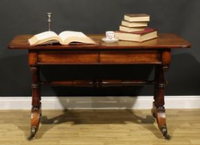 A Post-Regency mahogany library table, rounded rectangular top above a pair of frieze drawers,