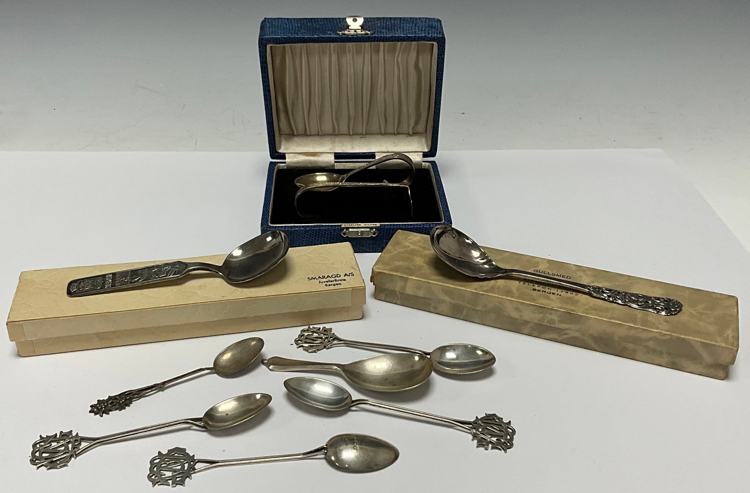 A Norwegian silver souvenir spoon, Bergen, marked 60GR, 31g, boxed; another similar spoon, marked