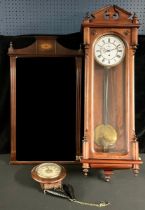 A 19th century style Vienna wall clock, 104cm high; a postman's type circular wall clock; an