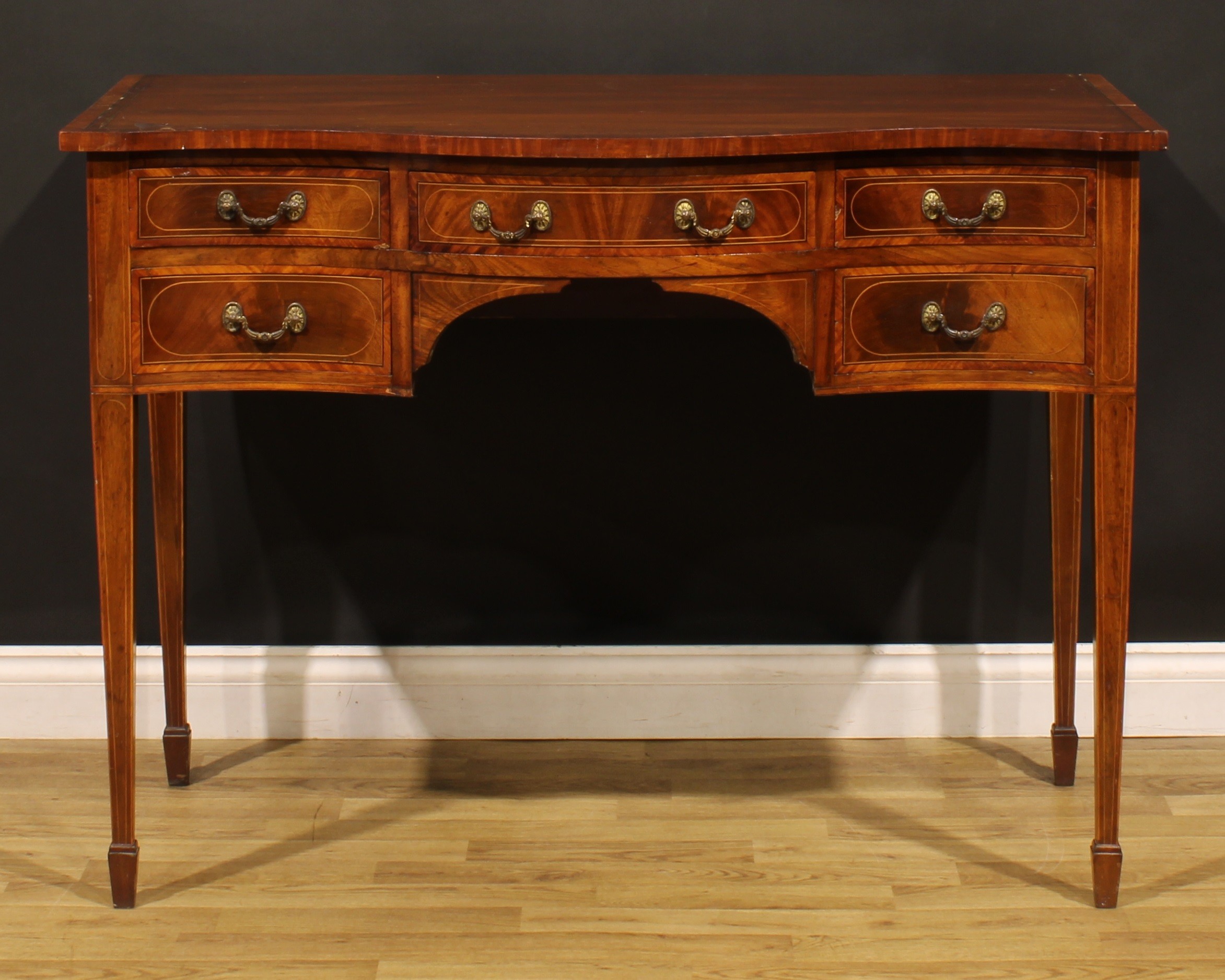A Sheraton Revival satinwood banded mahogany serpentine serving table, oversailing top above five - Image 2 of 6