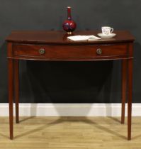 A 19th century mahogany bowfront side table, oversailing top above a long frieze drawer, tapered