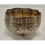 A 19th century unmarked Indian silver metal coloured basket, cast throughout with foliage, pierced