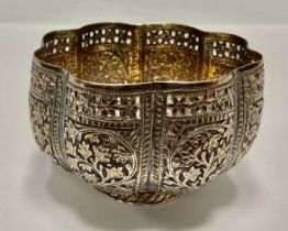 A 19th century unmarked Indian silver metal coloured basket, cast throughout with foliage, pierced