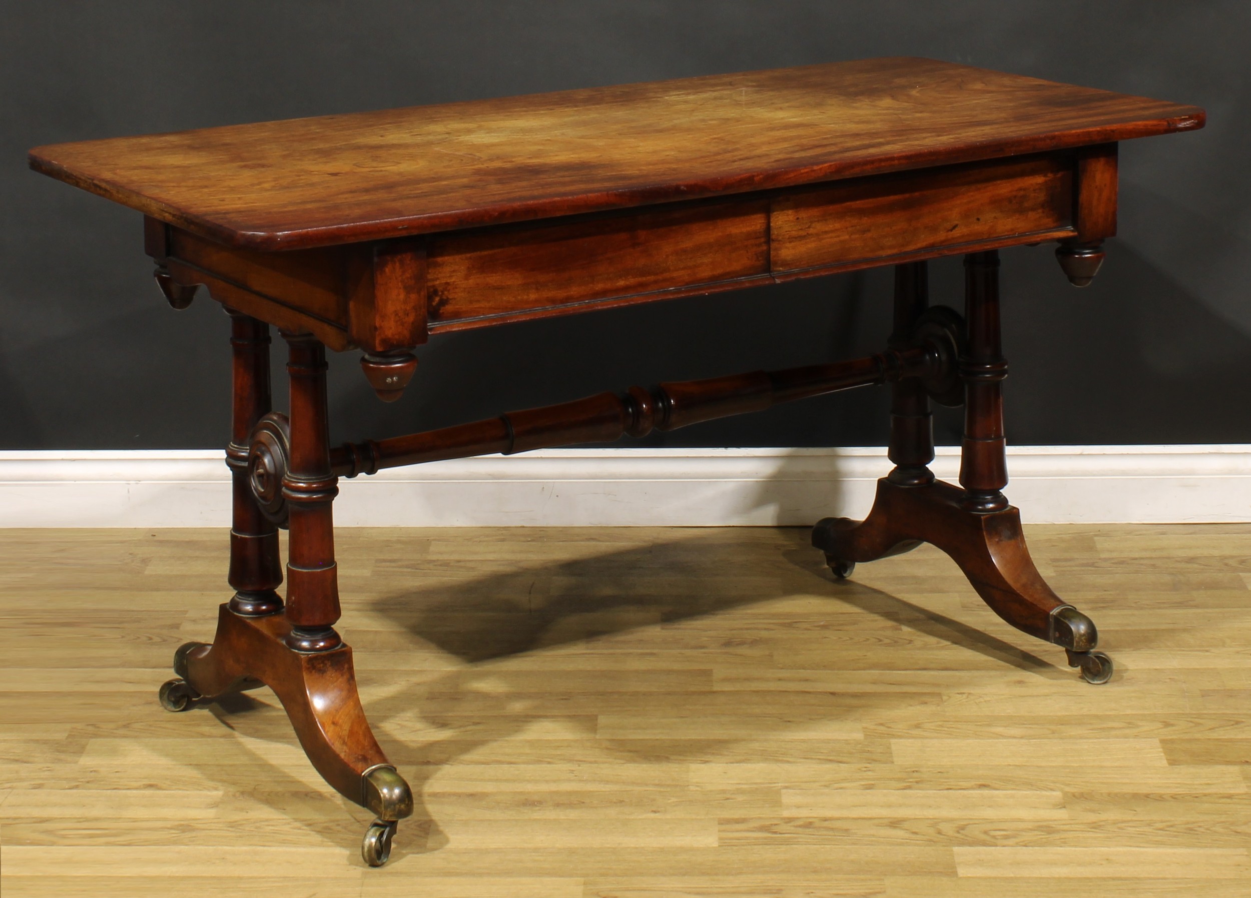 A Post-Regency mahogany library table, rounded rectangular top above a pair of frieze drawers, - Image 3 of 6