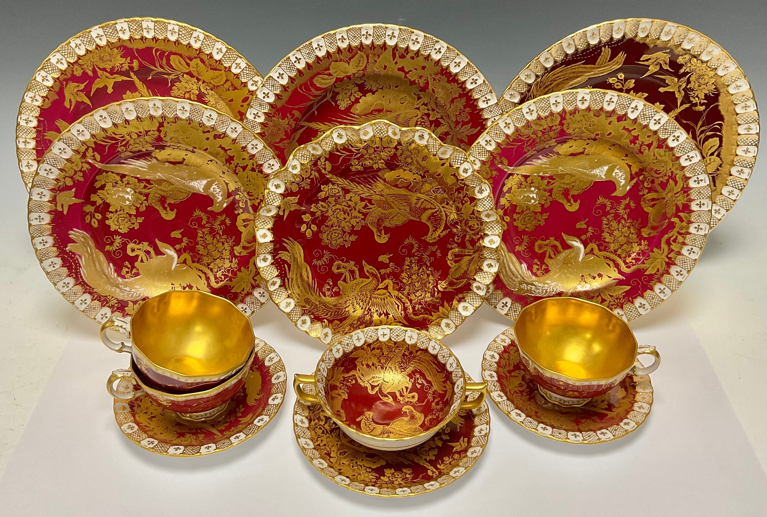 A Royal Crown Derby Red and Gold Aves pattern part dinner service, heraldic border, including soup - Image 2 of 2