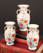 An English porcelain garniture, of two-handled ovoid vases, probably Spode, painted in the Chinese