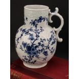 A Worcester Cabbage Leaf Jug Floral pattern Dutch jug, decorated in underglaze blue with scrolling