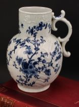 A Worcester Cabbage Leaf Jug Floral pattern Dutch jug, decorated in underglaze blue with scrolling