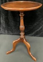 A George III style mahogany tripod wine table