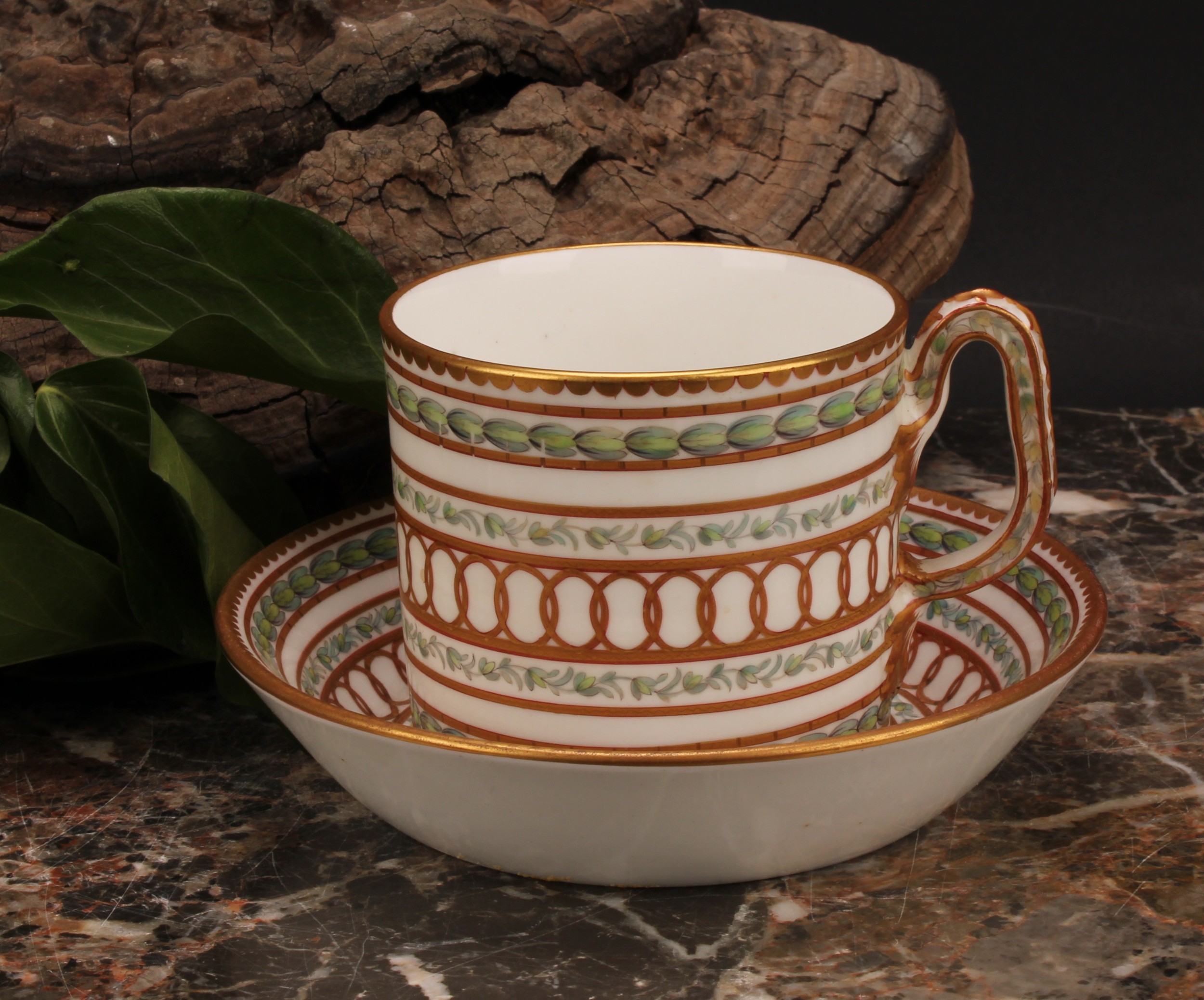 A Champion's Bristol cabinet coffee can and saucer, of cylindrical shape, painted in Neo-classical