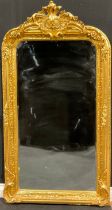 A Louis XIV style ‘Baroque’, arched, gilt-wood effect mirror, approx. 157cm high, 84cm wide