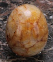 A 19th century Derbyshire spar egg shaped specimen or paperweight, 6cm long