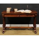 A Post-Regency Gothic Revival mahogany library table, canted rectangular top with moulded edge above