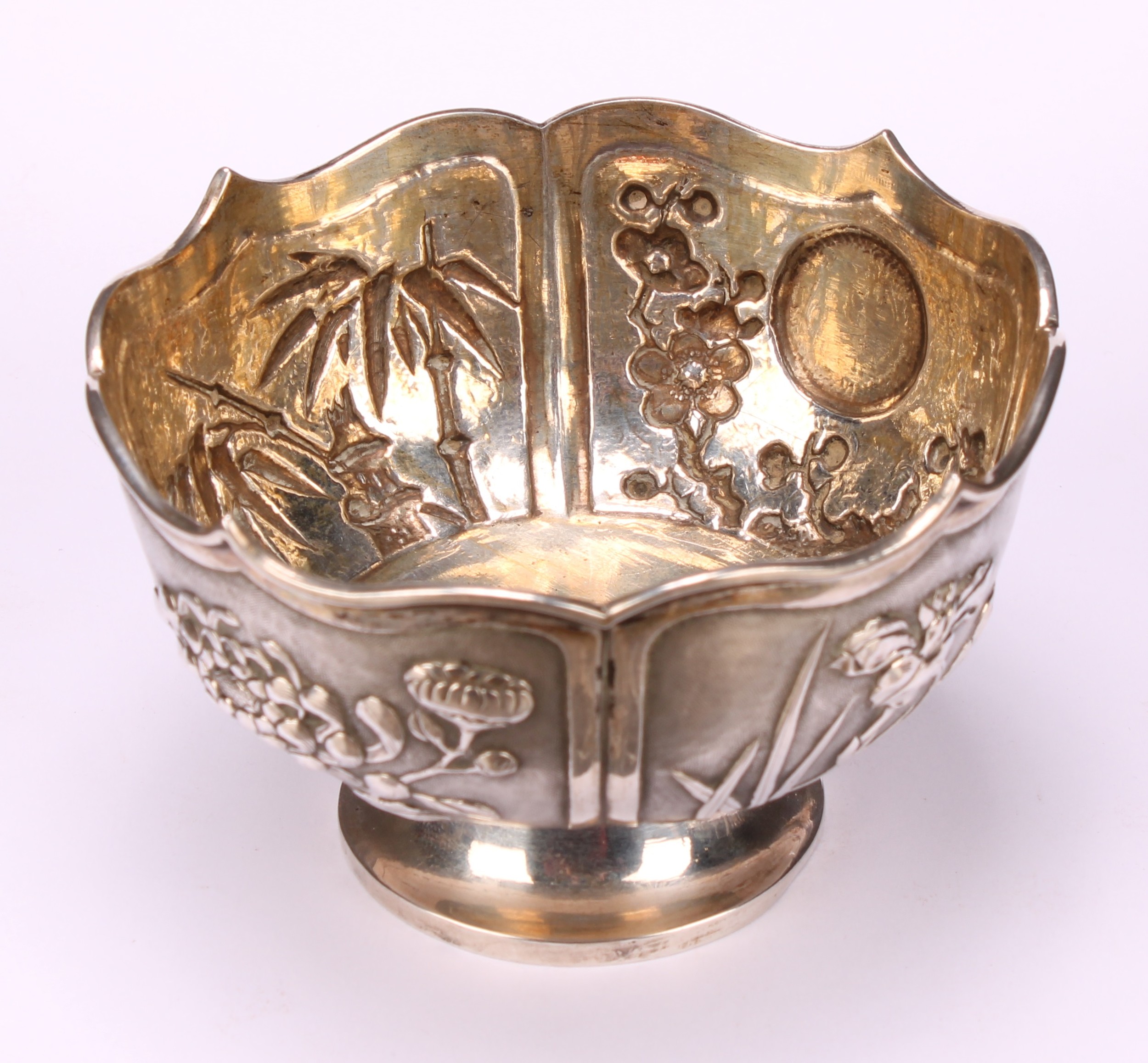 A Chinese silver lotus shaped pedestal bowl, applied with panels of chrysanthemums, bamboo, irises - Image 2 of 4