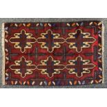 Oriental Rugs and Carpets - a Baluchi carpet, 141cm x 91cm