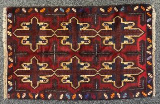 Oriental Rugs and Carpets - a Baluchi carpet, 141cm x 91cm