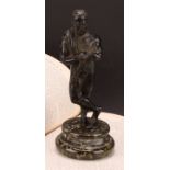 A late 19th century Grand Tour patinated bronze, of Hercules, draped with a pelt, masked club in