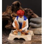 A Royal Worcester figure, Karen Singh - Toolmaker, modelled by James Hadley, 11.5cm high, crown