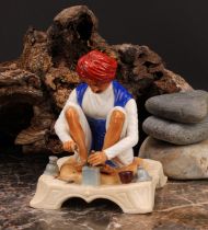 A Royal Worcester figure, Karen Singh - Toolmaker, modelled by James Hadley, 11.5cm high, crown