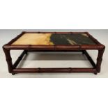 A Chinese faux bamboo framed stand, the top inset with a rectangular simulated hardstone in