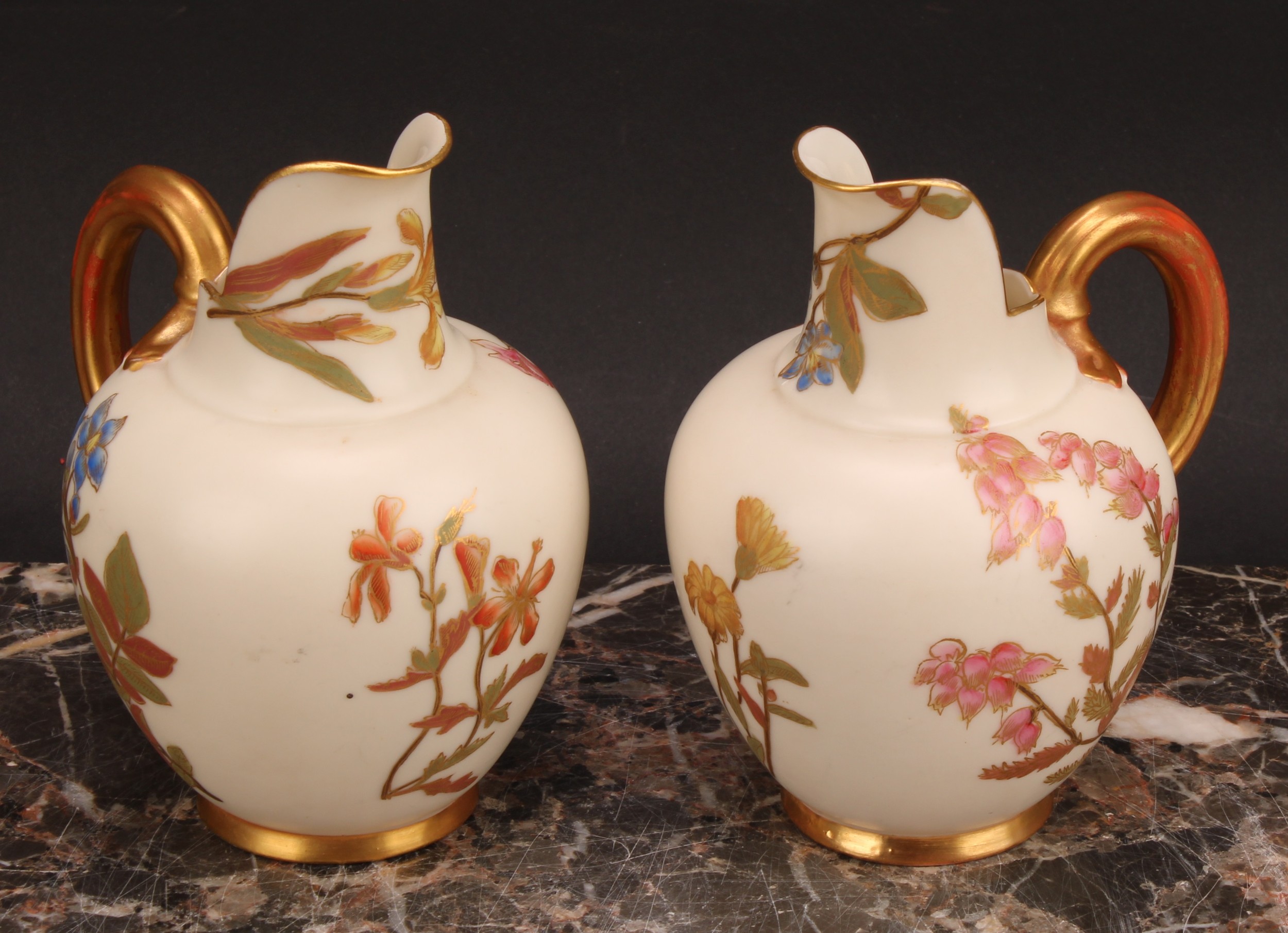 A pair Royal Worcester flat back jugs, decorated in the Aesthetic manner with floral sprays in muted - Image 2 of 12