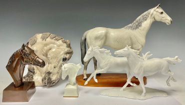 Equestrian Interest - a Beswick model of a dappled grey horse, matt glaze, oval mahogany plinth