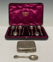 A set of six Victorian silver teaspoons, sugar bows en suite, red velvet lined red Morocco case,