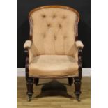 An early Victorian mahogany library chair, stuffed-over upholstery, scroll hand rests, turned