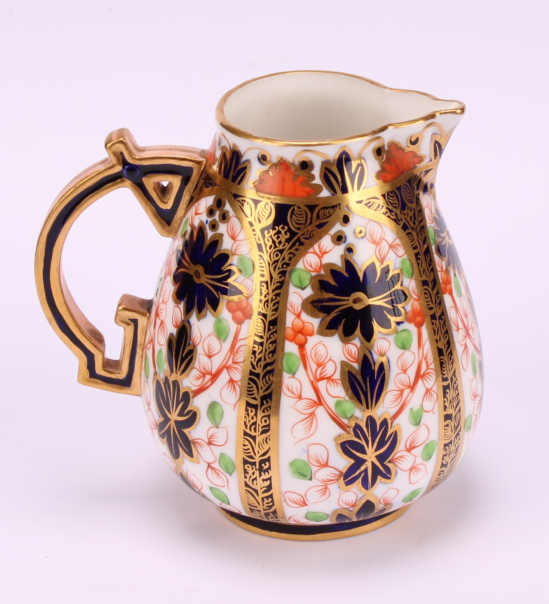 A Derby Crown Porcelain Company Imari palette 1128 pattern milk jug and two handled sucrier and - Image 3 of 9