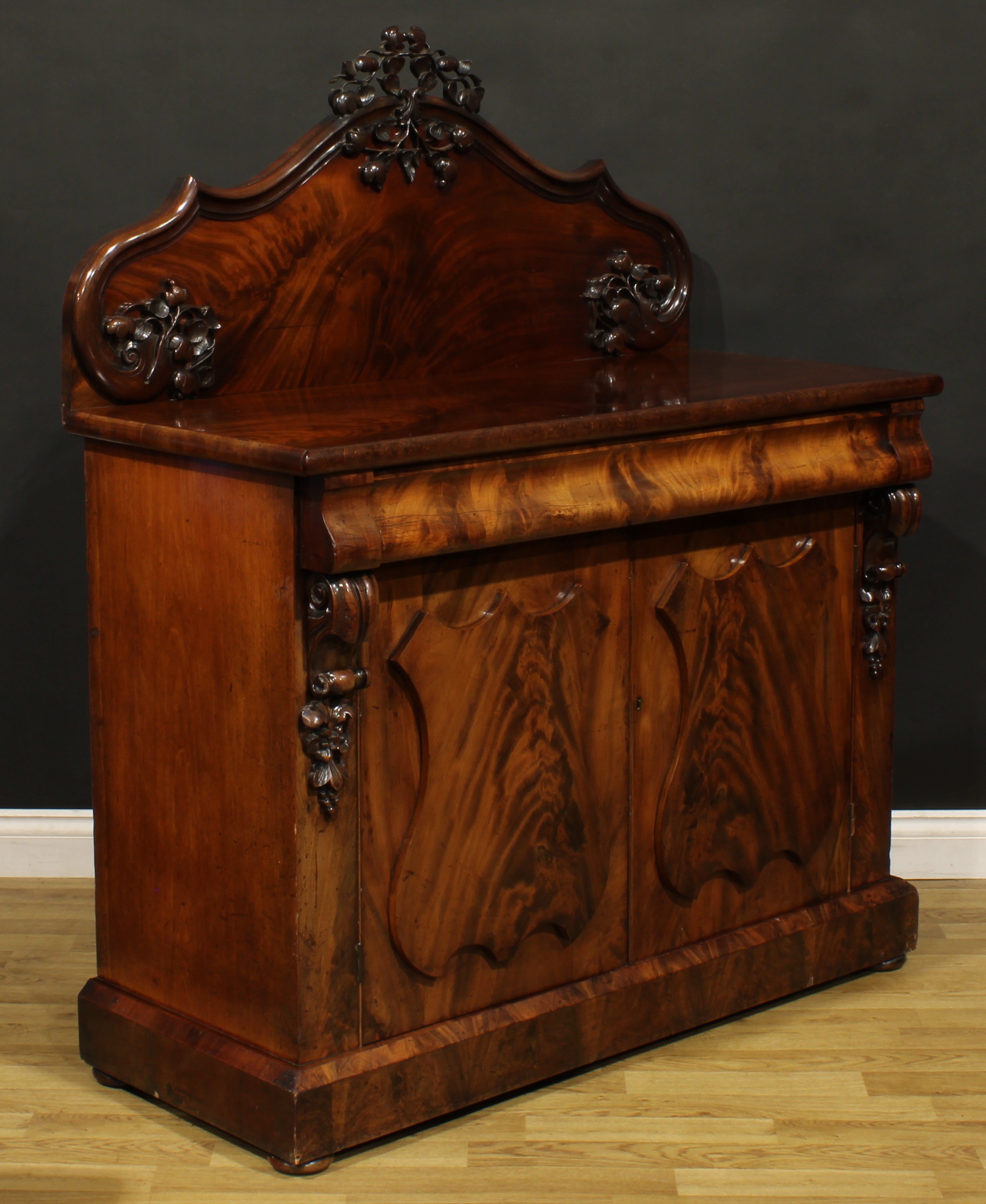 A Victorian flame mahogany buffet serving cabinet or sideboard, slightly oversailing top with shaped - Image 3 of 6