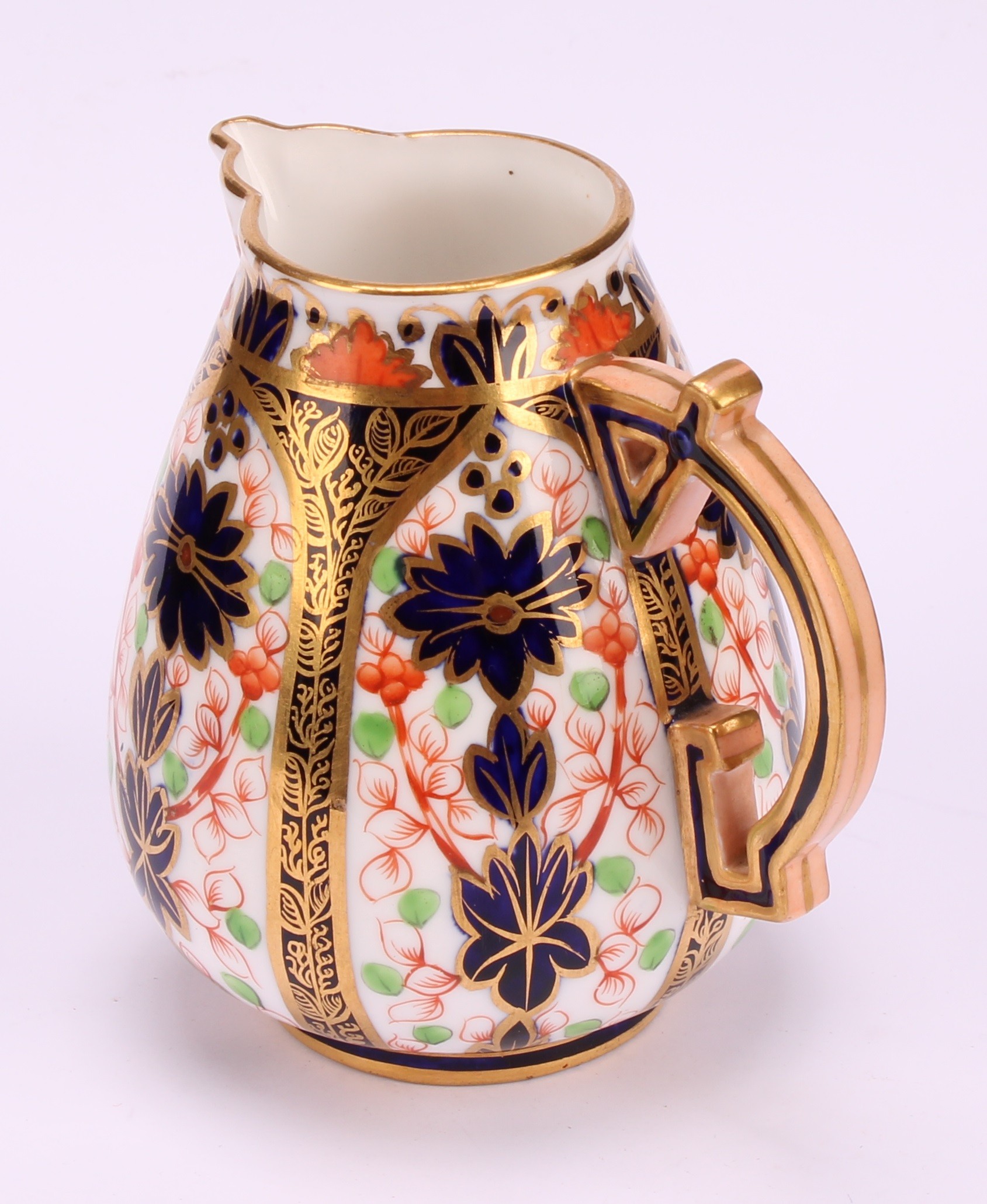 A Derby Crown Porcelain Company Imari palette 1128 pattern milk jug and two handled sucrier and - Image 4 of 9