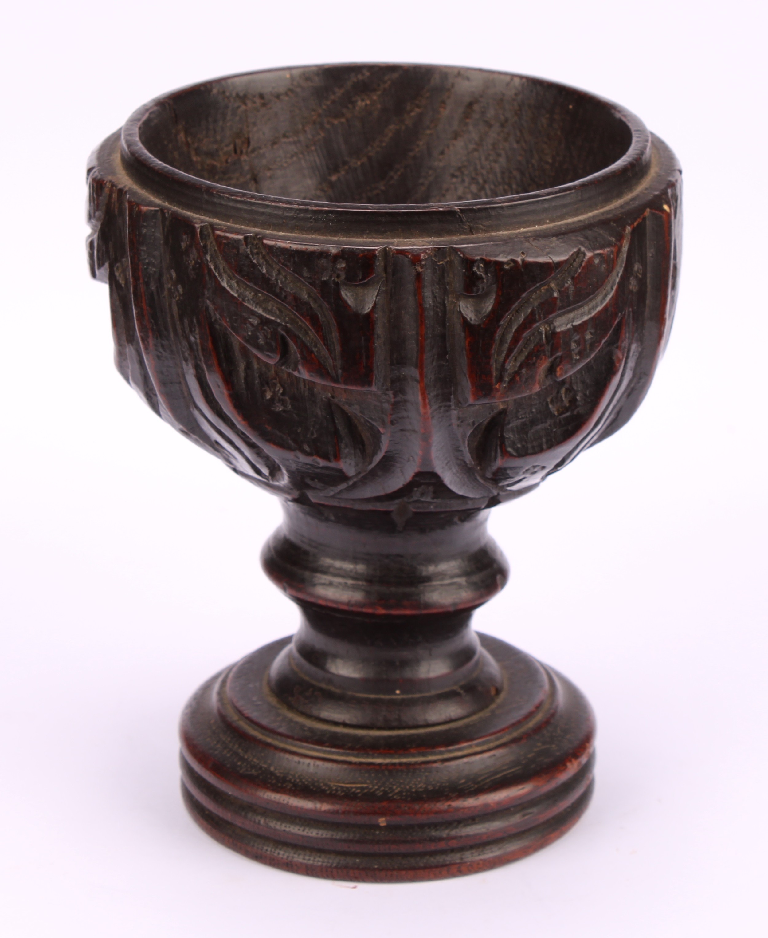 A 19th century oak goblet or chalice, the bowl carved with acanthus, turned base, 14cm high, - Image 2 of 3