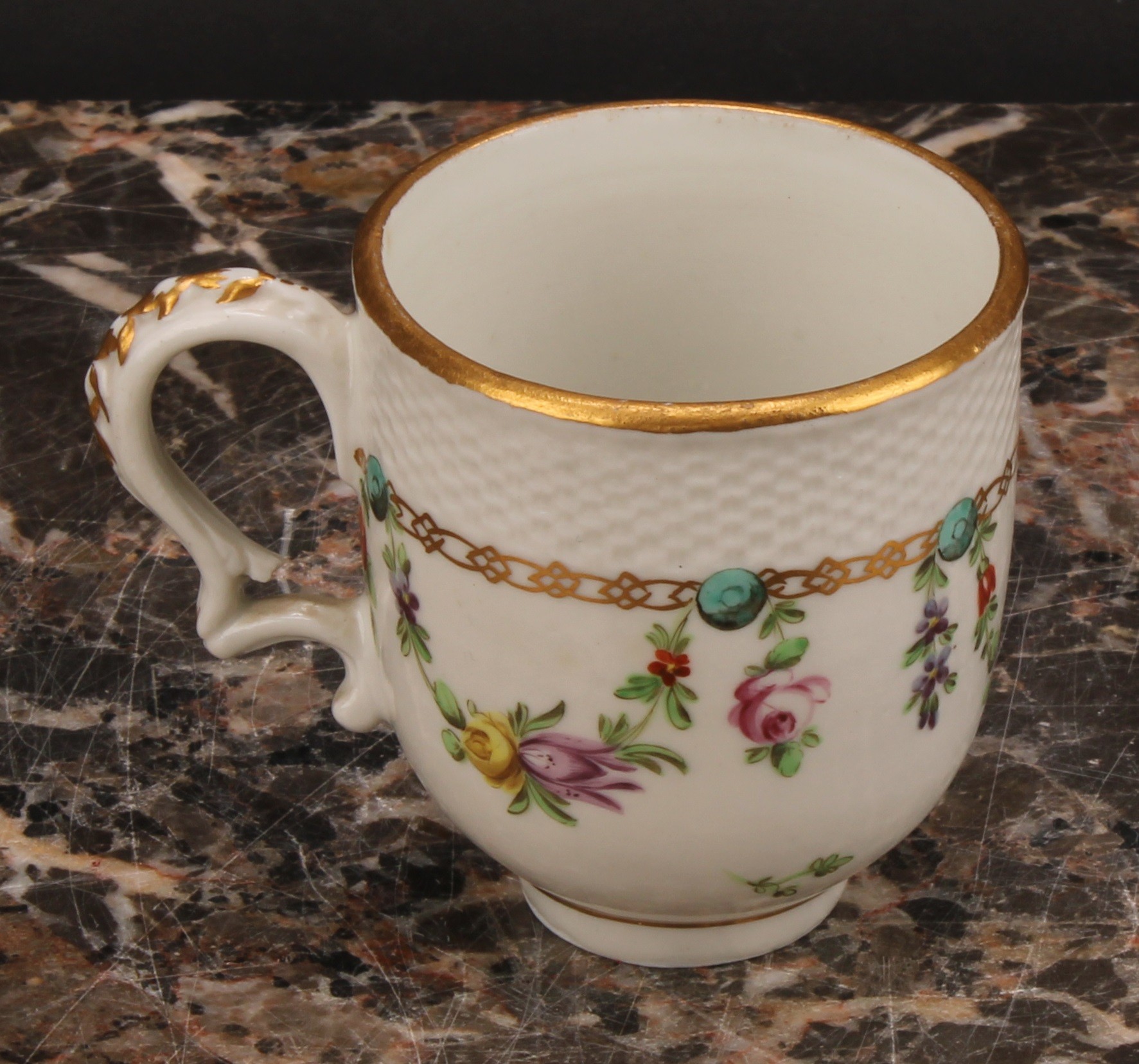 A Bristol coffee cup and saucer, basket weave moulded border, enamelled with polychrome swags - Image 4 of 9