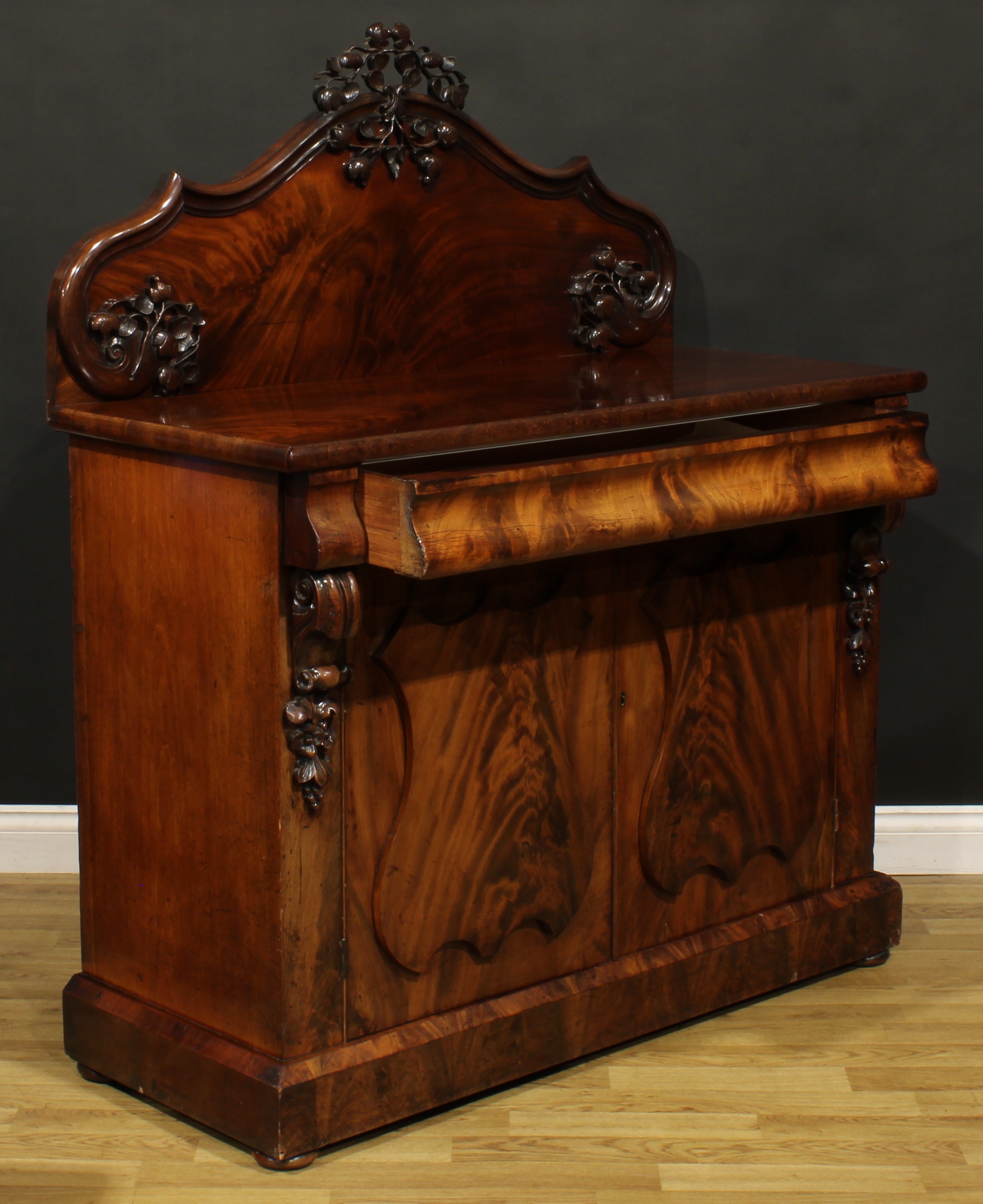A Victorian flame mahogany buffet serving cabinet or sideboard, slightly oversailing top with shaped - Image 4 of 6