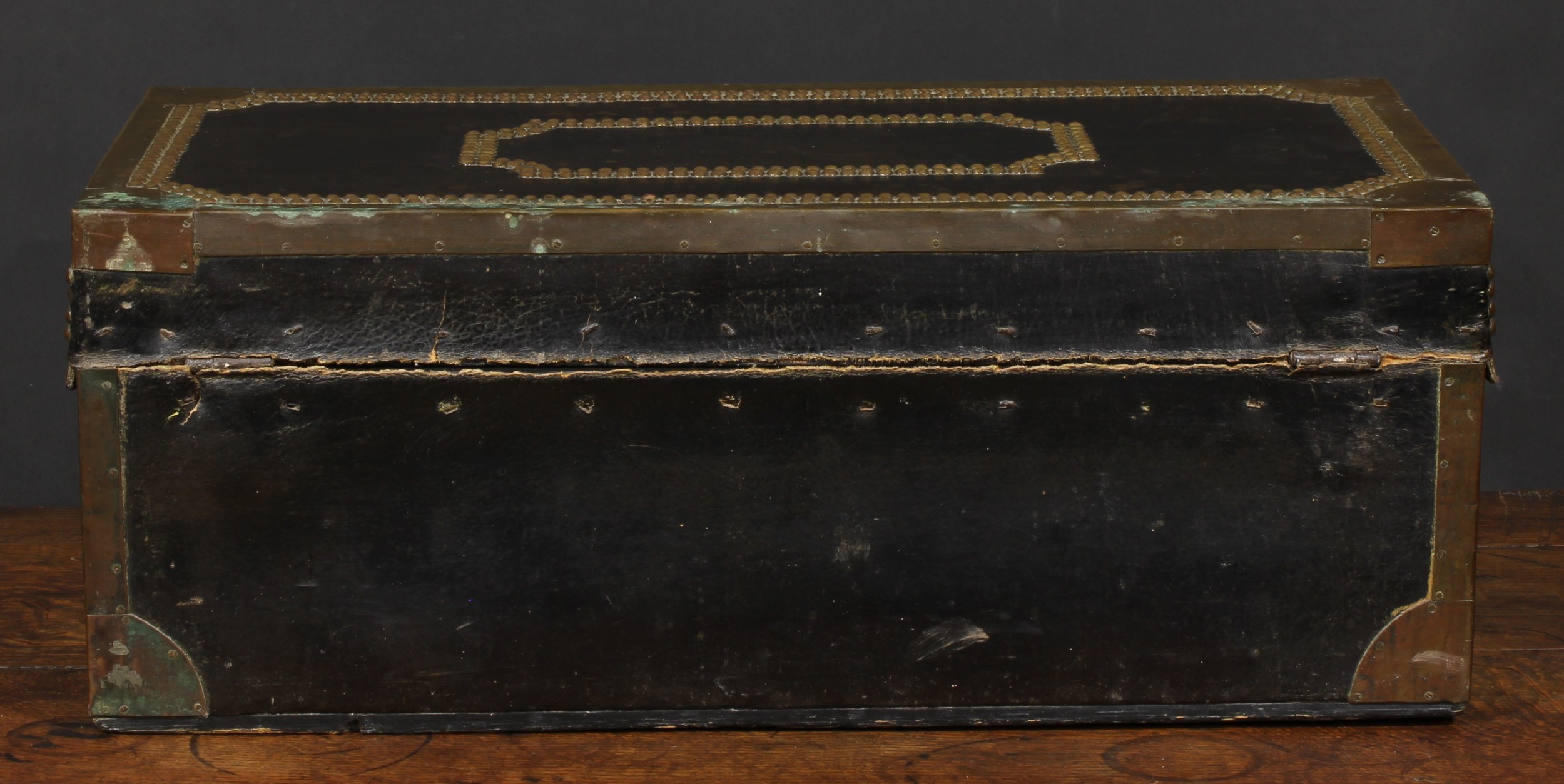 An early 19th century brass and studded leather mounted camphor travelling or coaching trunk, hinged - Image 5 of 5