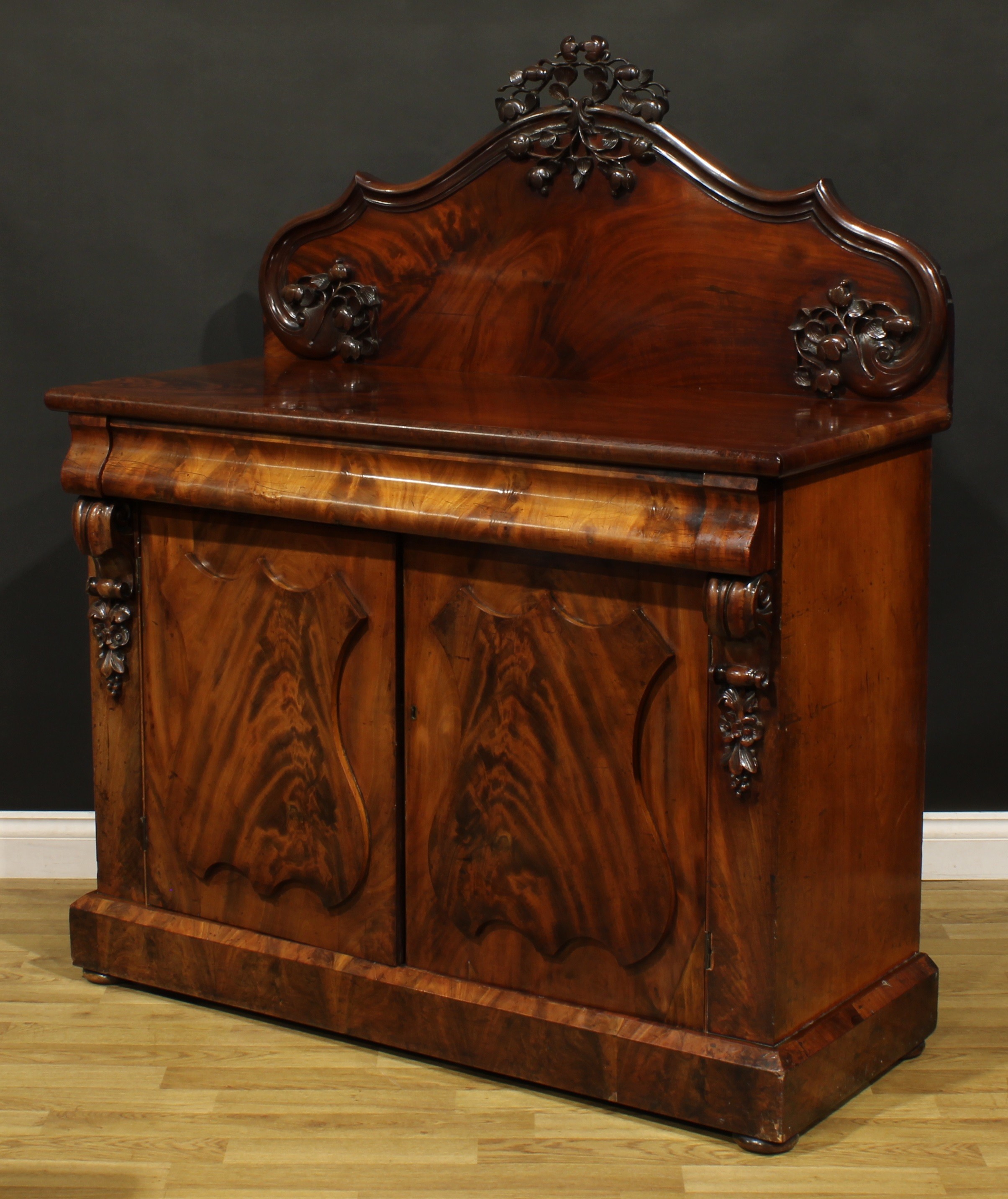 A Victorian flame mahogany buffet serving cabinet or sideboard, slightly oversailing top with shaped - Image 5 of 6